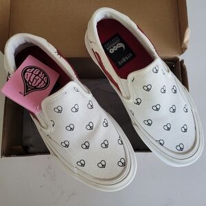 STYXIE Women's Canvas Slip-On Sneakers - White with Black Hearts